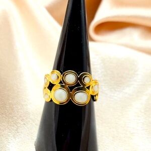 Elegant Gold and Cream Ring